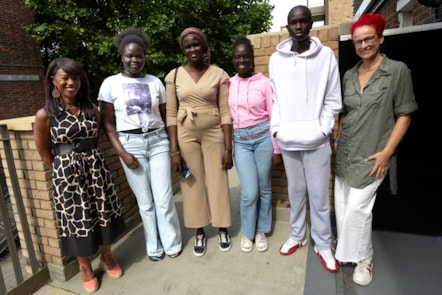 Dr Debbie Weekes-Bernard and Cllr Chapman pose with a resettled family