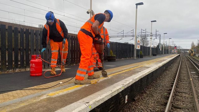 Platform safety lines being painted