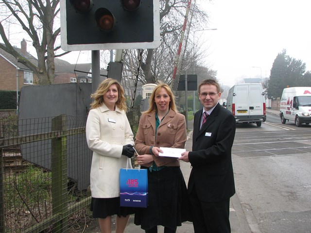 Safety competition winner: L-R Gilly White, Internal Communications Officer - First TransPennine Express; Mrs Jayne Beadle; Neil Henry, Area General Manager - Network Rail