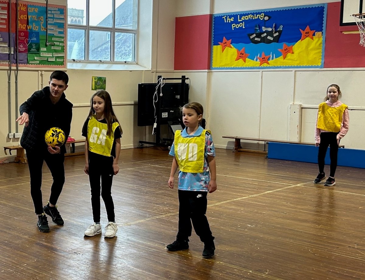 Jags midfielder, Marcus Goodall, with pupils at Cluny Primary in Buckie ahead of his club’s Scottish Cup game on Sunday (21 January) against Celtic.