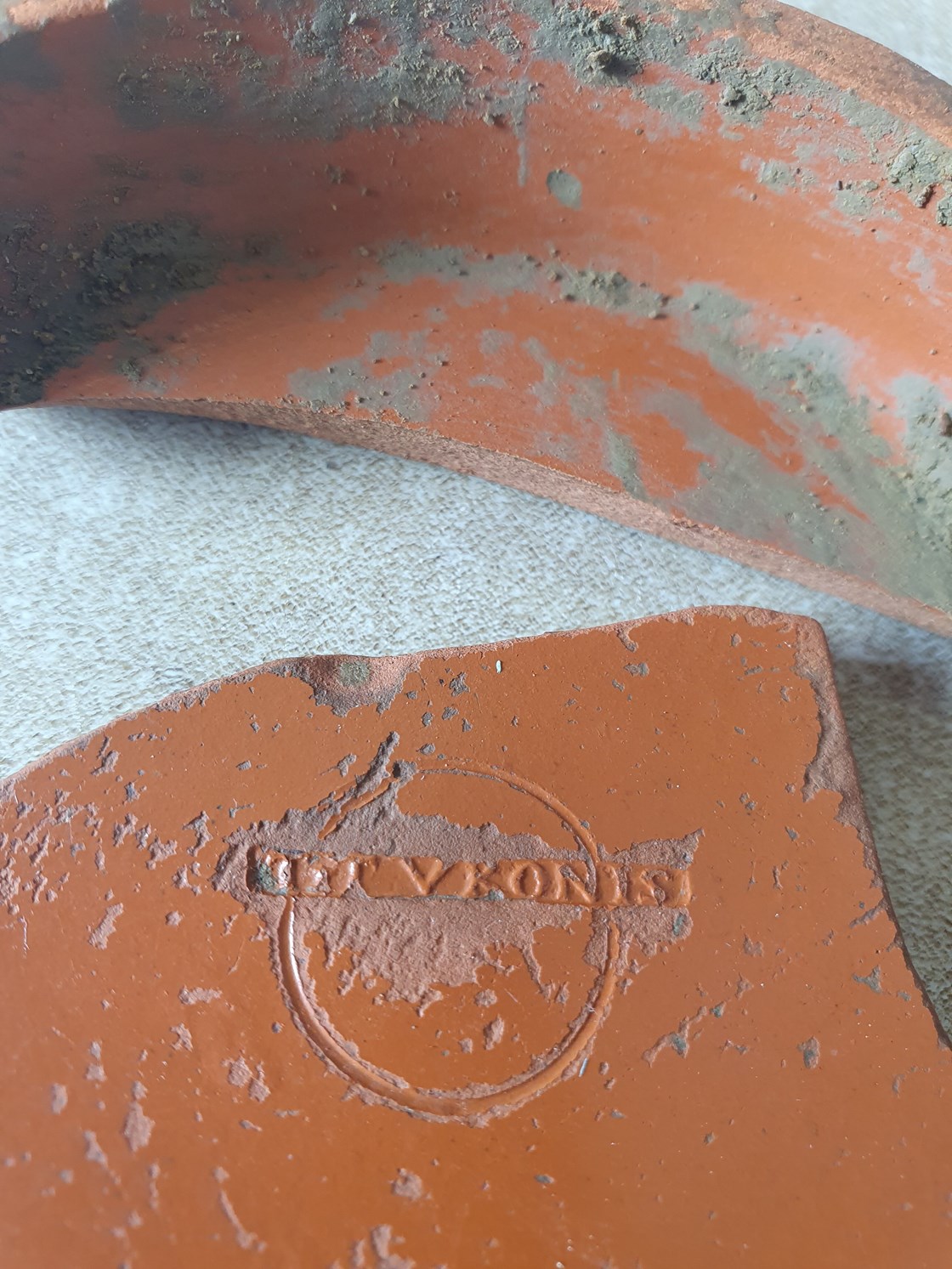 Samian pottery dish, with makers mark, uncovered during archaeological excavations at Fleet Marston, near Aylesbury,: Samian pottery dish, with makers mark, uncovered during archaeological excavations at Fleet Marston, near Aylesbury, Buckinghamshire. Excavations took place during 2021.

Tags: Archaeology, Heritage, Roman artefacts, History, Excavations