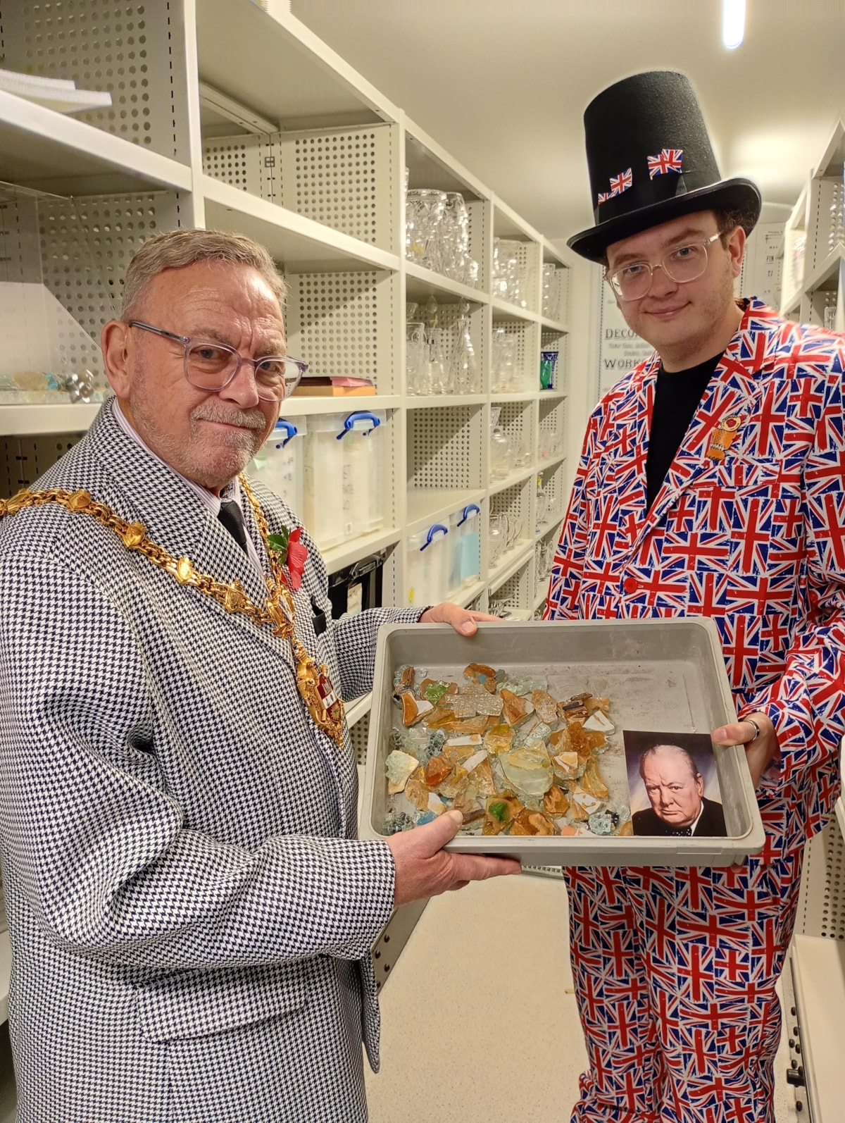 Alexander Goodger, Director Stourbridge Glass Museum and the Mayor of Dudley with pieces from the screen