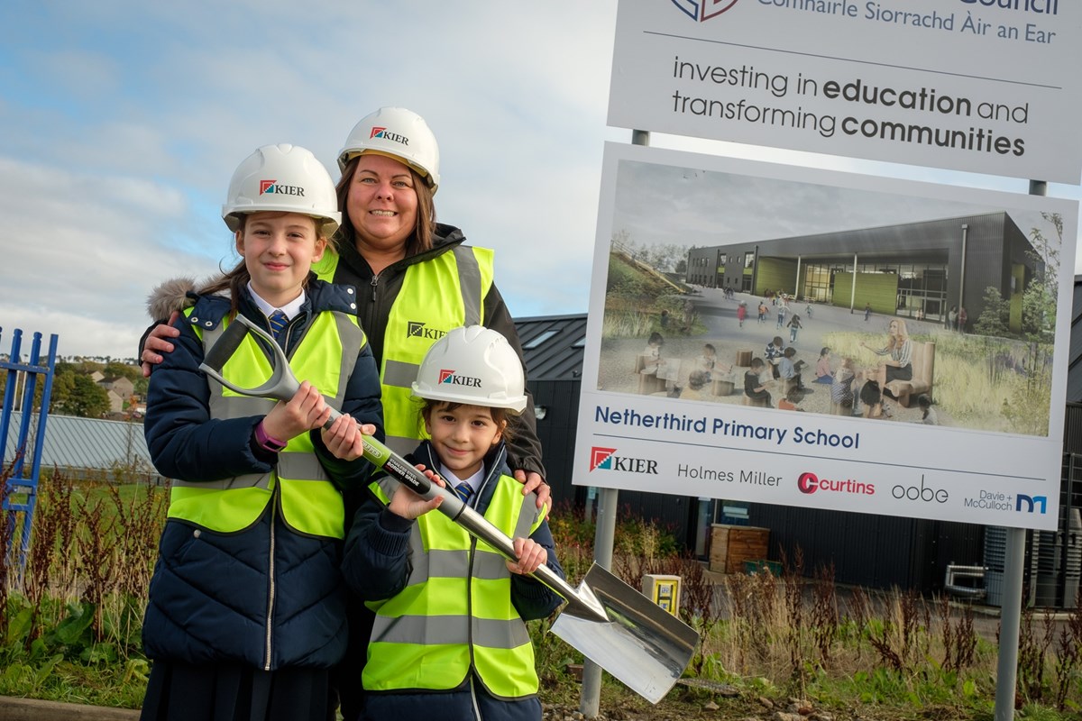 Evie and Lucy with Head Teacher Jemma Donnelly at the site of the new Netherthird Primary