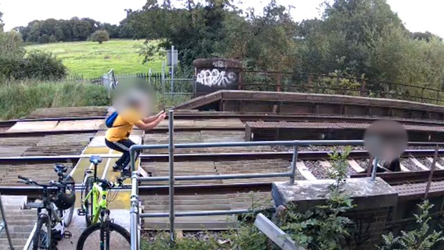 Network Rail issues safety warning after shocking CCTV footage shows people deliberately misusing a level crossing in West Berkshire: Dangerous behaviour at Calcot Mill level crossing