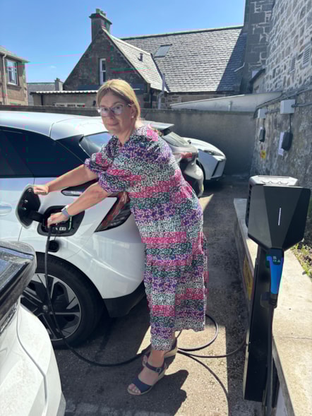 Moray Council Leader, Cllr Kathleen Robertson, EV charger portrait