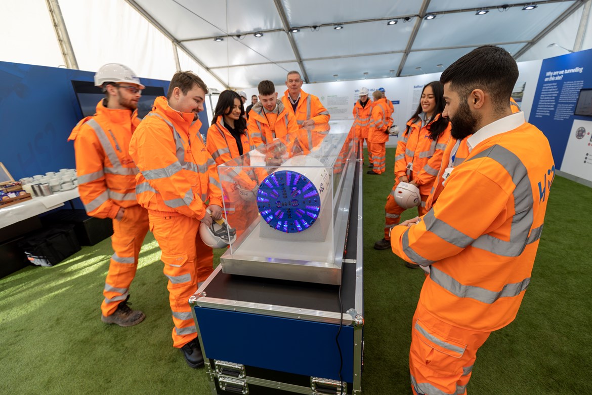 HS2 welcomes first tranche of West Midlands ‘Kickstart’ young people to project: BBV Kickstarters and apprentices with a model of TBM Dorothy