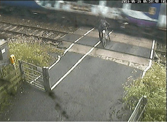 CCTV shows cyclist in terrifying near-miss with train: Ducketts Level Crossing