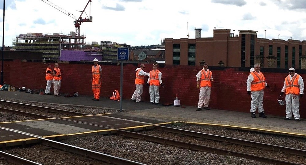 Volunteers from Network Rail cleaned the graffiti from near the railway in Sheffield-2