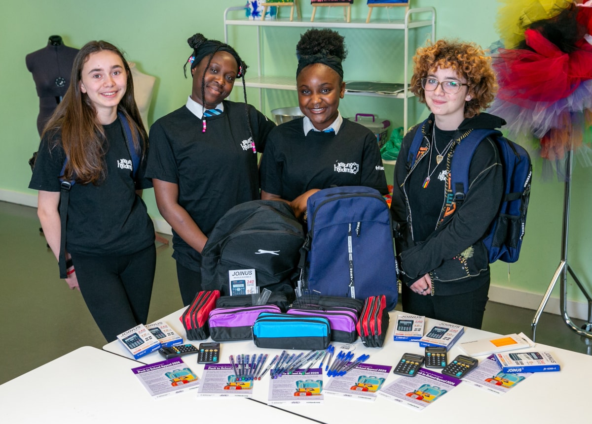 Four Hackney Youth Parliament members with some of the school supplies needed as part of the Pack to School Appeal 2024