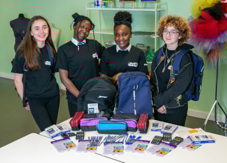 Four Hackney Youth Parliament members with some of the school supplies needed as part of the Pack to School Appeal 2024