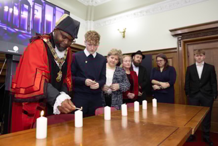 Candle lighting at the Islington Holocaust Memorial Day event