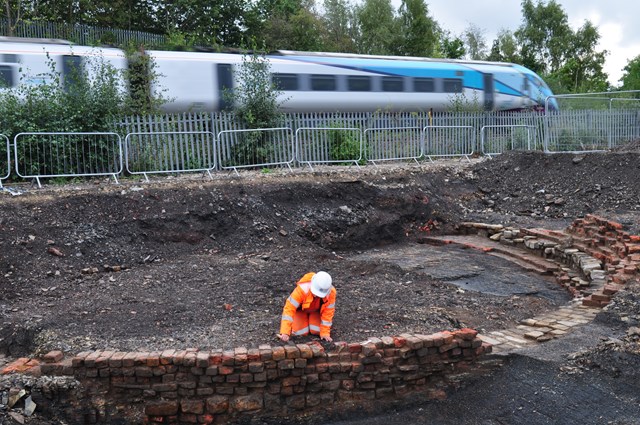Team member excavating the newly-discovered sidings at Hillhouse