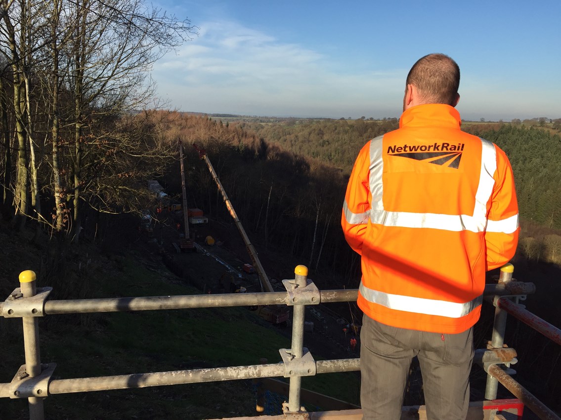 Network Rail staff looking over the work ongoing at Eden Brows