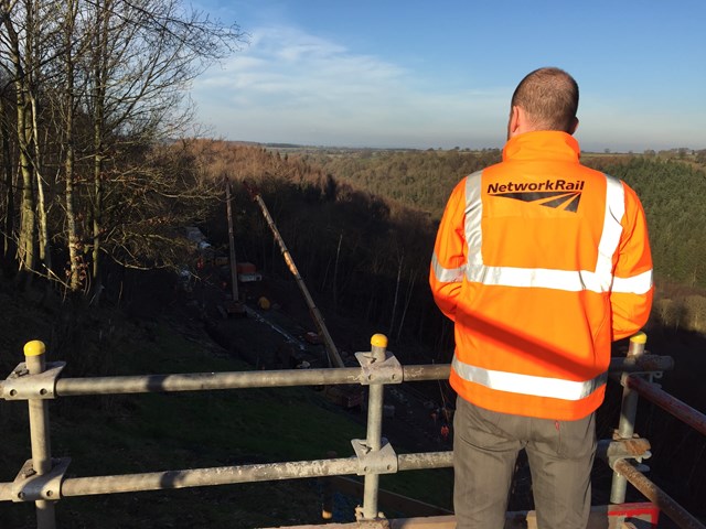 Network Rail staff looking over the work ongoing at Eden Brows