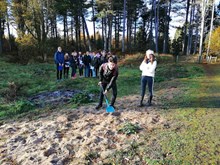 Madras students cutting the first sod