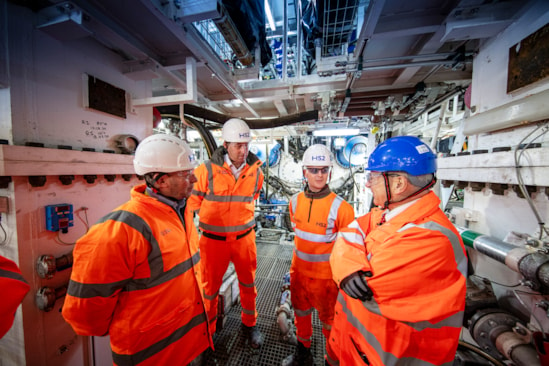 Rail Minister and new HS2 CEO at Old Oak Common station box to see Euston TBMs: L-R: Mark Wild, HS2 CEO; James Richardson, Managing Director, SCS JV, Bailey Prett, Tunneling Apprentice, SCS JV, Lord Peter Hendy, Rail Minister