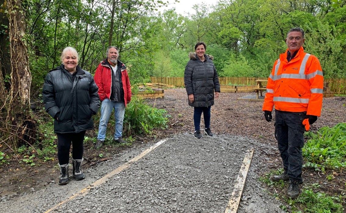 Coed Bach park_Grovesend: From right to left: Suzan Jones from Friends of Coed Bach park, Andrew Edwards from Our Place, Tonia Antoniazzi, MP for Gower and Lee Ackerman, Network Rail Project Manager