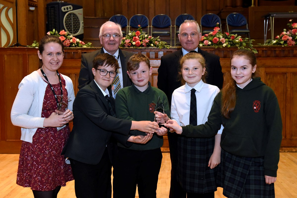Winners Joanne Barclay and JRSOs from St Patricks Primary with Cllr Grant and Kerr Chalmers