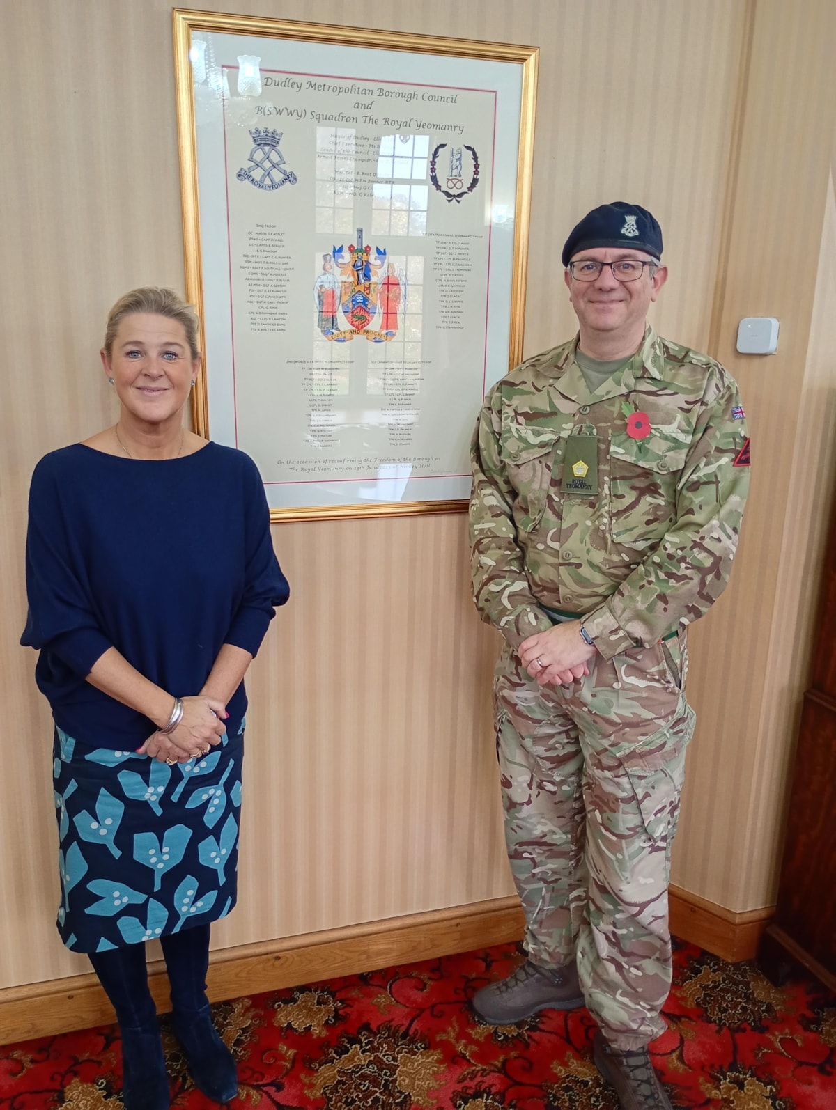 Artist Clare Donegan BEM and Maj JP Astley DL B (SWWY) Squadron, The Royal Yeomanry, with  and a copy of the Freedom of the Borough Scroll