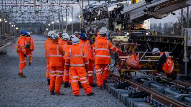 Track panels being lowered from Kirow crane at Hanslope Junction renewal December 2025: Track panels being lowered from Kirow crane at Hanslope Junction renewal December 2025