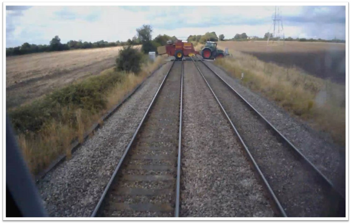 Farmers are dicing with death at level crossings, as one incident involving a farming vehicle is reported on average every week in Britain: train travelling 85mph narrowly misses farm vehicle at level crossing  2