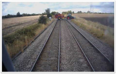 train travelling 85mph narrowly misses farm vehicle at level crossing 2