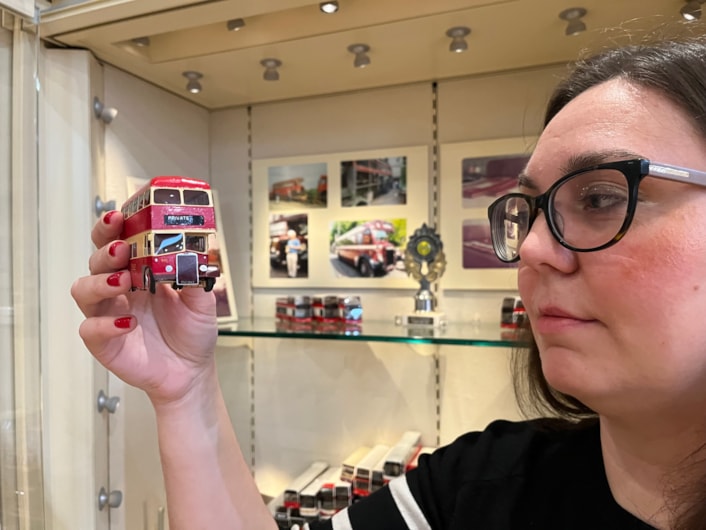 Bus collection: Assistant community curator Sapphia Cunningham-Tate alongside the new display at Leeds City Museum which gives visitors a chance to see a selection of the vast array of replicas created by physicist Dr Gordon Brooke.
The meticulously detailed models each relate to a specific real-life equivalent, complete with service number and with every painstaking detail reproduced using card, packaging and acetate for the windows.