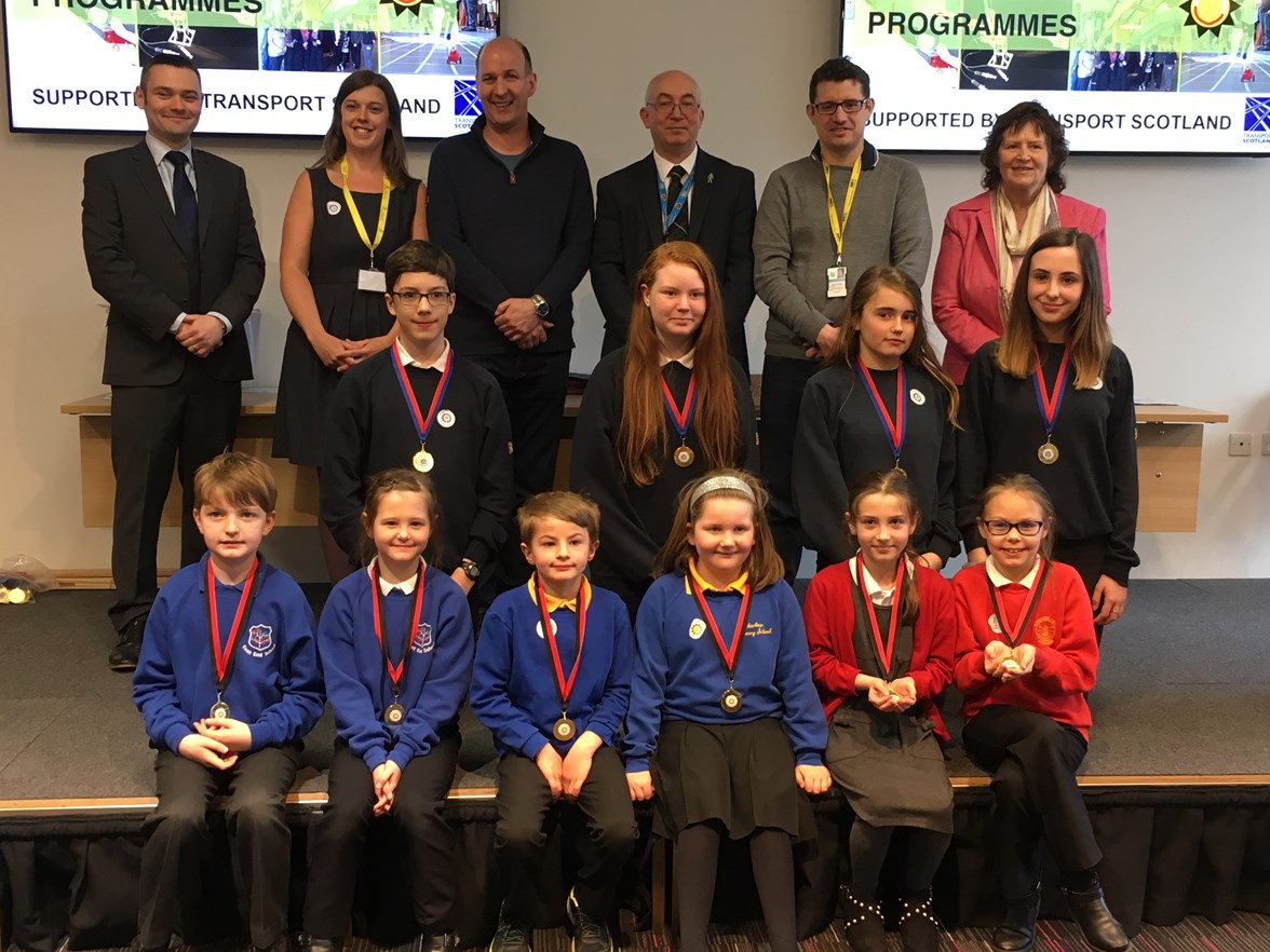 Happy prize winners with staff from Transport Scotland, the design consultants MMS, Primary Engineering and Moray College UHI