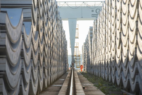 Chiltern Tunnel pre-cast yard, January 2023: View of precast tunnel wall segments stacked at the tunnel yard, ready to be transported into the tunnel.