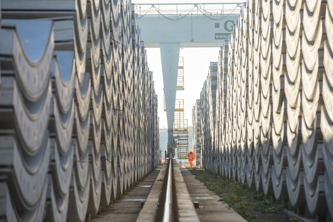 Chiltern Tunnel pre-cast yard, January 2023: View of precast tunnel wall segments stacked at the tunnel yard, ready to be transported into the tunnel.