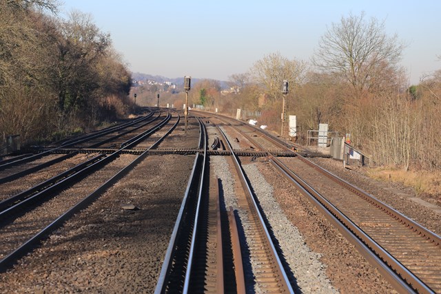 Dean Farm from the driver's cab of a train: Dean Farm crossing from the cab