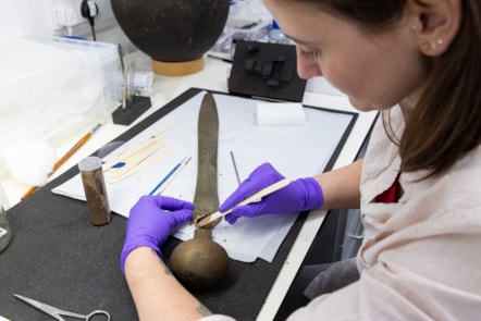 Conservator Bethan Bryan works on the Leadburn sword. Image © Duncan McGlynn (1)