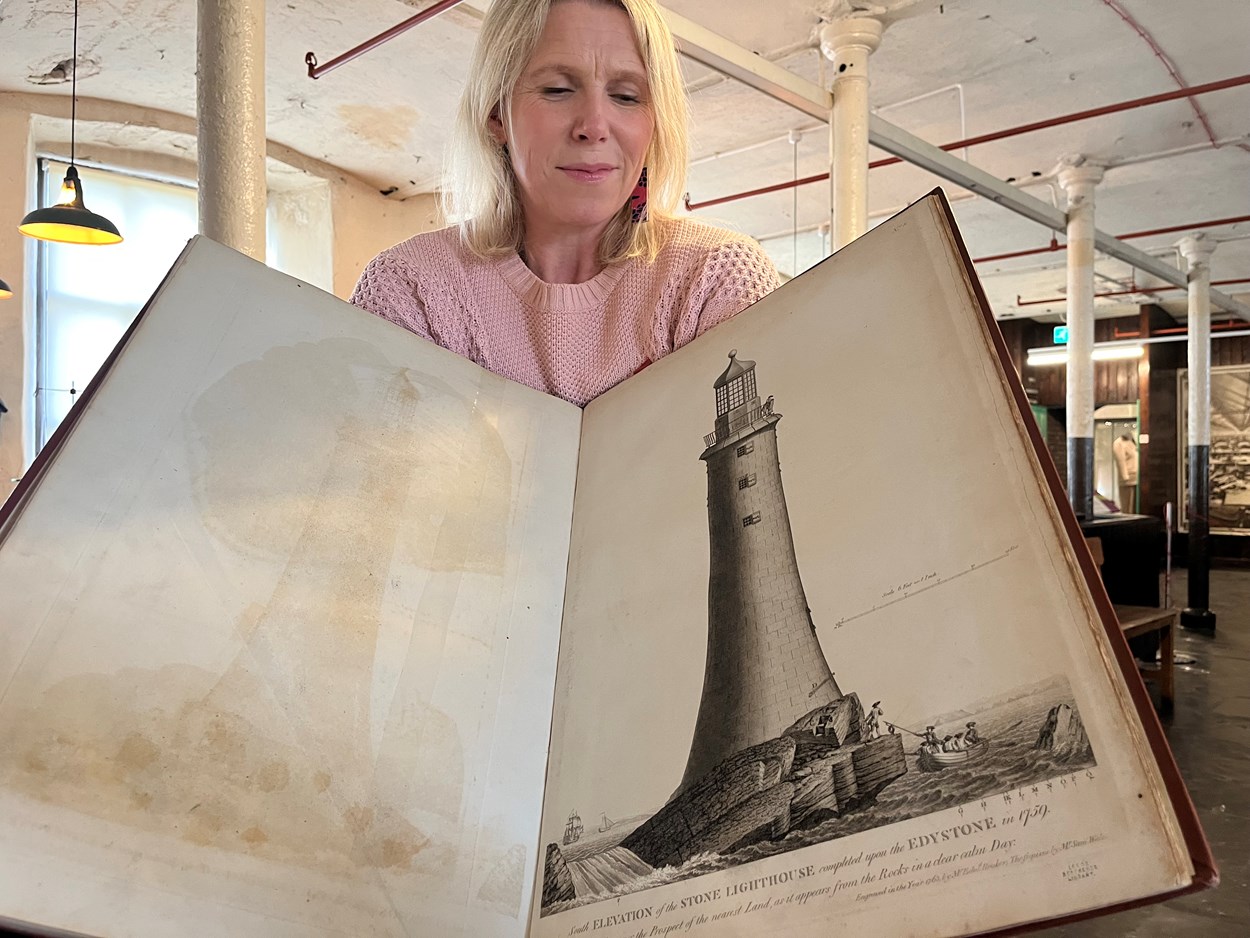 Engineery: Abby Dix-Mason of the Smeaton300 project with a book containing original plans for John Smeaton's famous Eddystone Lighthouse. The beautiful first edition, penned by Smeaton himself, is among the fascinating objects featured in Engineery, a new exhibition which has opened at Leeds Industrial Museum.