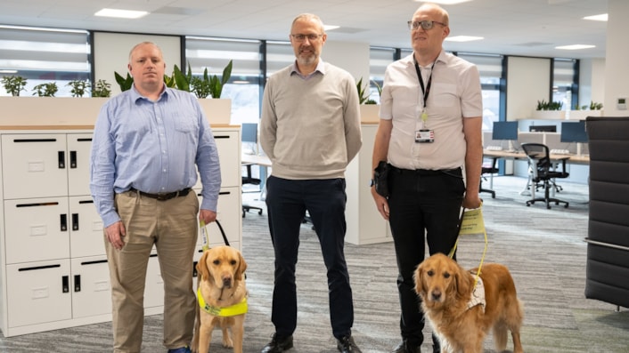 Nathan Foy, Guide Dogs Cymru and Joey the Guide Dog, Geoff Ogden TfW and Ryan Moreland and Guide Dog Jamie