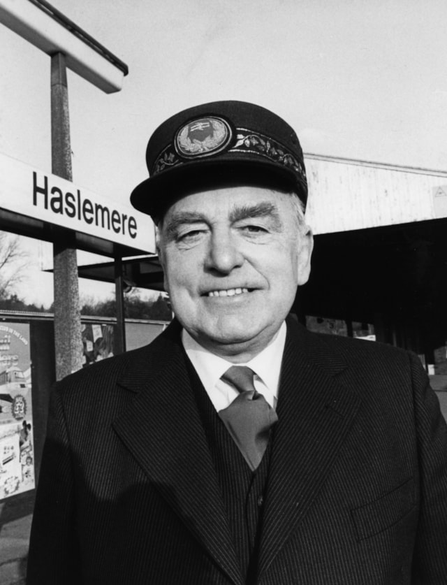 Mike Lamport's father, Matthew Lamport at Haslemere Station: A male station man stood in uniform at Haslemere train station.