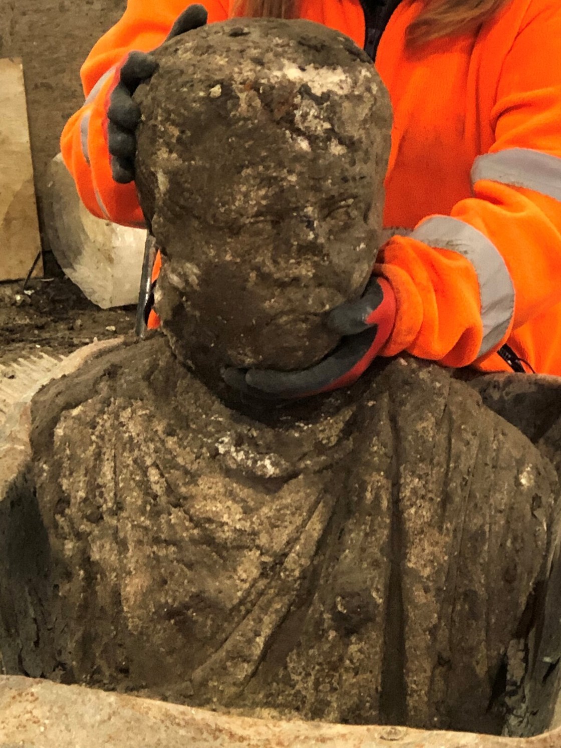 Complete male bust  -Artefacts from St Mary's Archaeological dig - Stoke Mandeville, Buckinghamshire-3: Complete male bust of Roman statue discovered during a HS2 archaeological dig at the site of old St Mary’s church in Stoke Mandeville, Buckinghamshire. The artefacts were found underneath the footprint of a Medieval church that was being excavated. 

Tags: Roman, Archaeology, Stoke Mandeville, Buckinghamshire