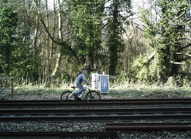 Child cycling on the railway in Shipley, Bradford