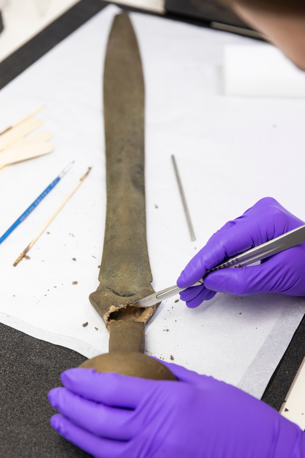 Conservator Bethan Bryan works on the Leadburn sword. Image © Duncan McGlynn (7)