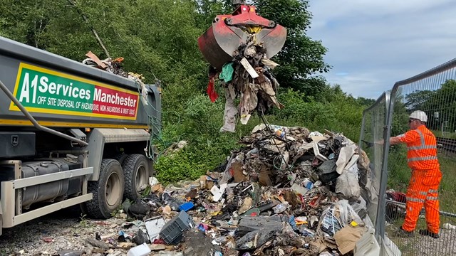 Specialist equipment used to clear fly tipping in Stalybridge