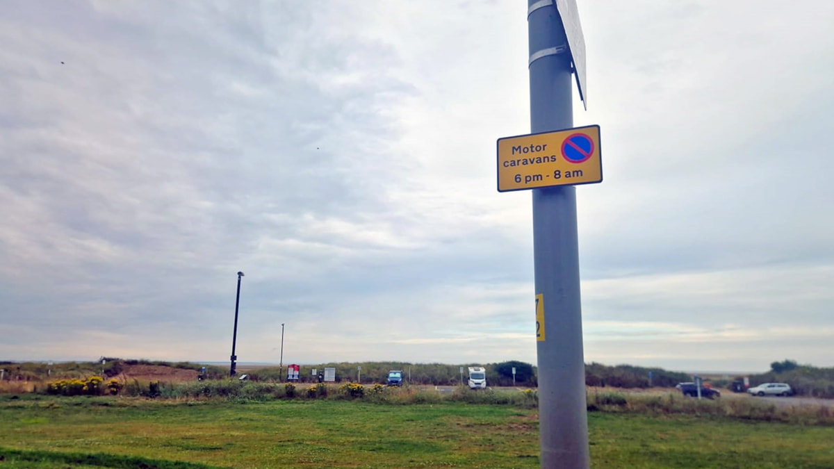 One of the signs informing drivers of new overnight motorhome parking restrictions throughout Lytham St Annes, taken from the promenade between Derby Road and Fairhaven Road