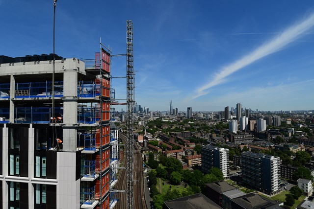 London apartments under construction by the railway (landscape)