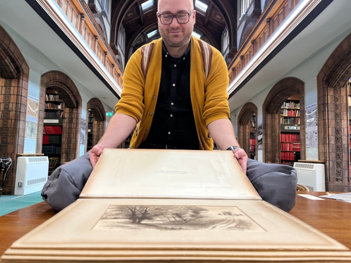 Battle books event: Librarian Josh Flint with a stunning collection of Wagstaffe Yorkshire Battle drawings from the 19th century, which include a series of beautifully detailed illustrations from the battlefields of Yorkshire.