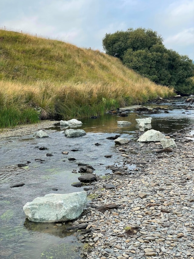 Boulders returning to the River Wye at Llangurig
