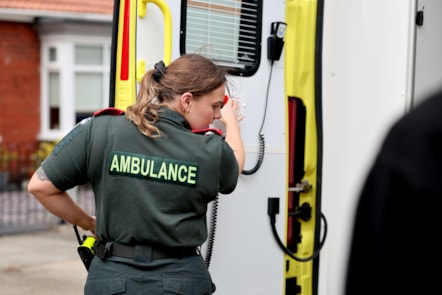 Paramedic closing ambulance door