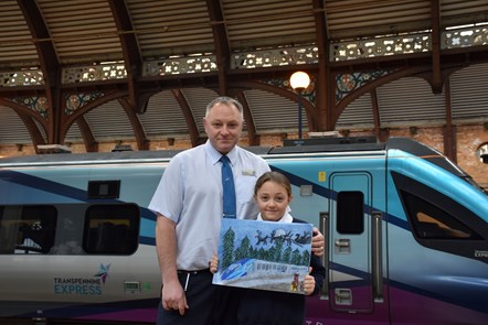 Quinn Kelly (8) from York won a competition to design TPE’s Christmas card after her artwork received a festive seal of approval. Pictured with dad Adam Kelly, TPE conductor instructor