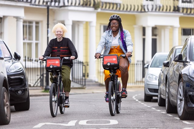 TfL Image - People cycling on electric Santander Cycles