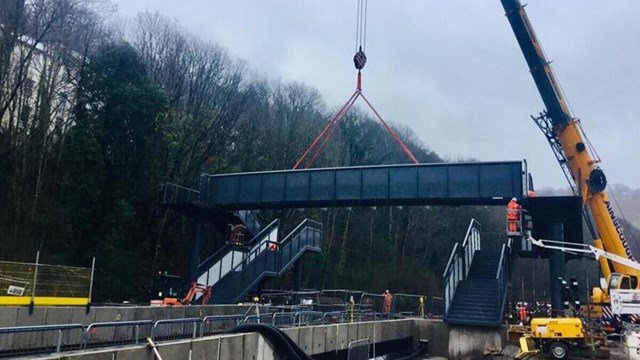 No crane no gain: Network Rail install first part of new fully accessible footbridge at Llanhilleth station: Llanhilleth footbridge crane lift hero