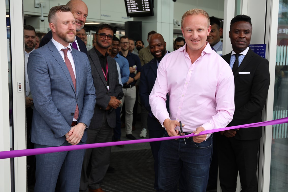 Ilford Completion Sam Tarry MP: Image shows Sam Tarry MP cutting the ribbon to mark the completion of Ilford station. With Network Rail's delivery director for Anglia, James Lewis, Infrastructure director for Crossrail and the Elizabeth line Stuart Mills, and Ilford BID manager Cyril Bekoe. 30 August 2022