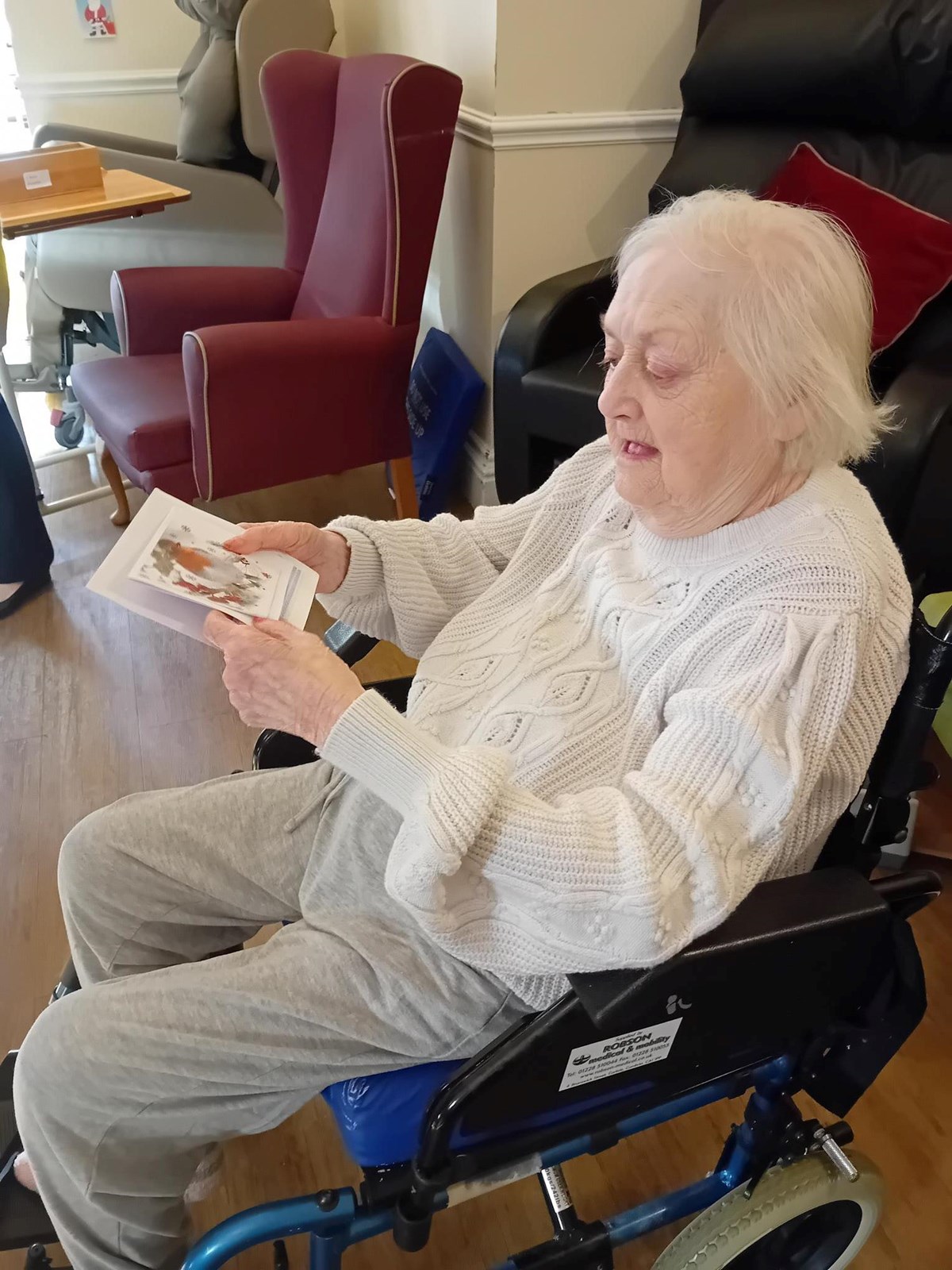 Audrey opening her card