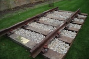 Railway track: Original railway track placed in the reflective garden as a memorial to the Necropolis Railway